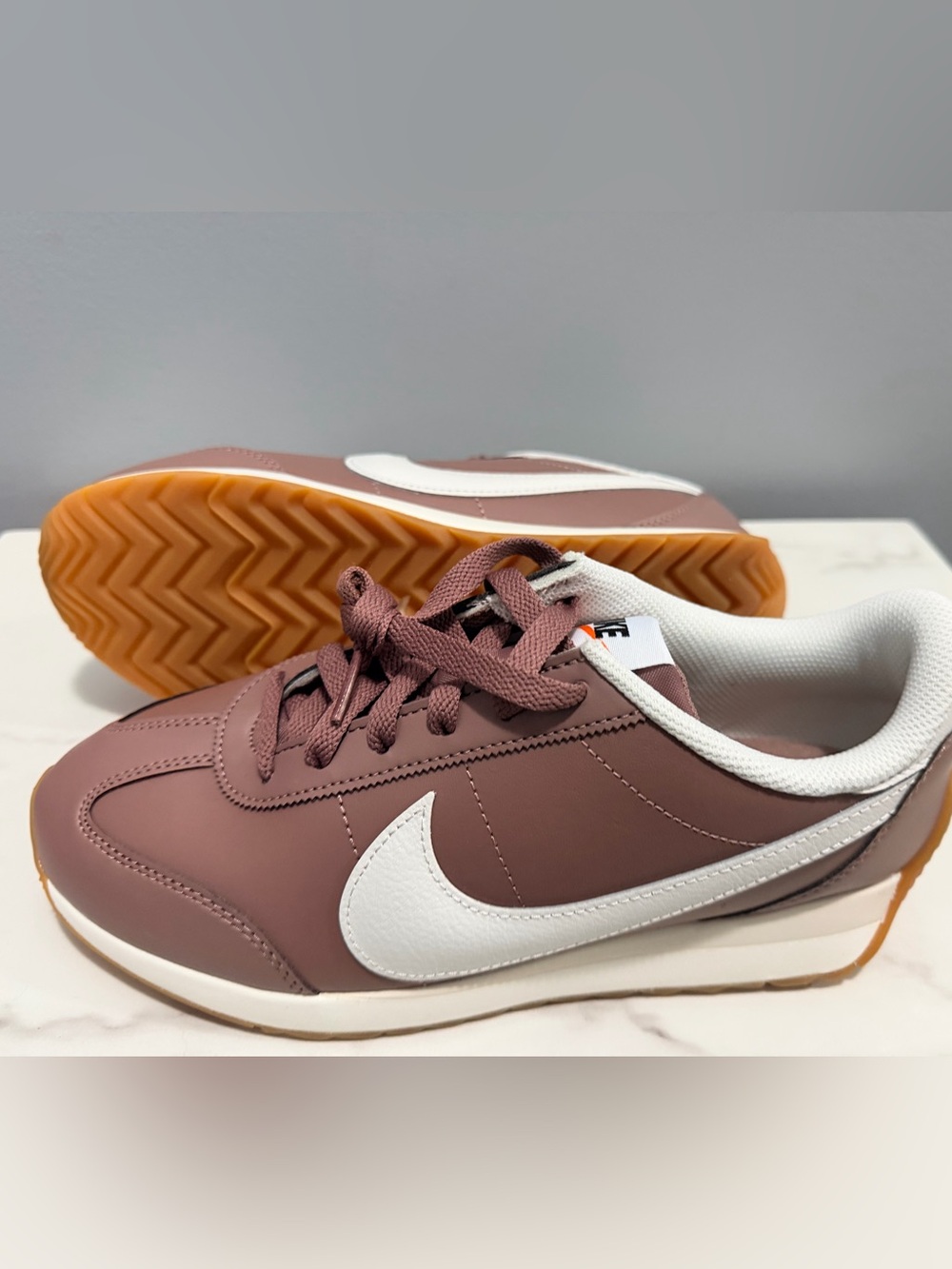 Nike 8 Women’s Retro Runner in dark Mauve